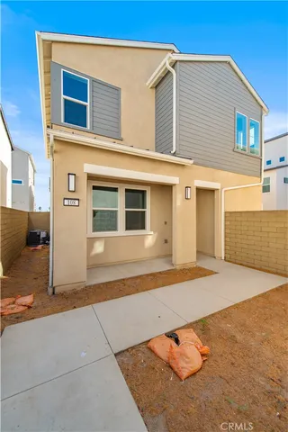 a front view of a house with a garage
