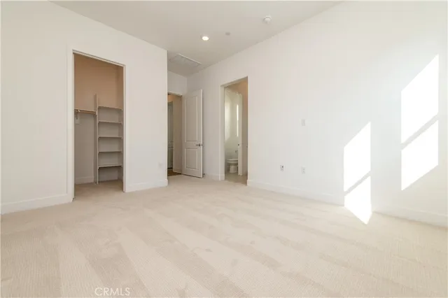 a bathroom with a shower sink vanity granite and a mirror