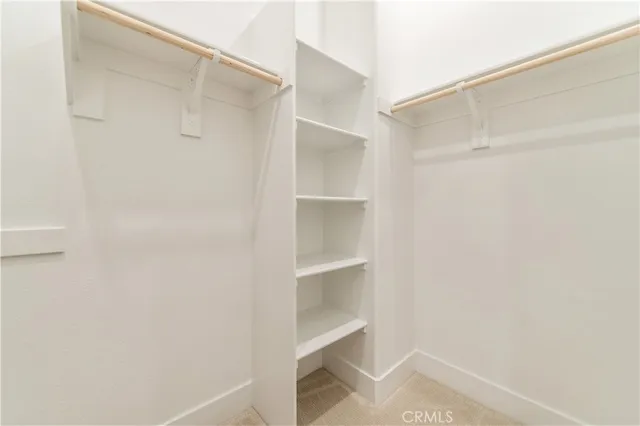 a view of a room with stairs and furniture