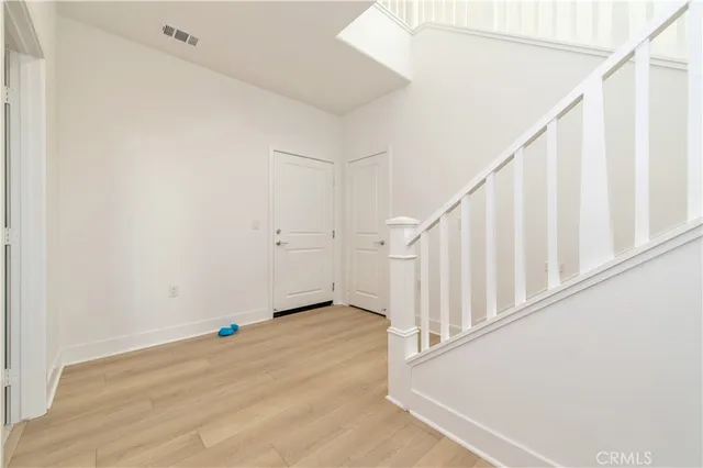 a view of entryway with stairs