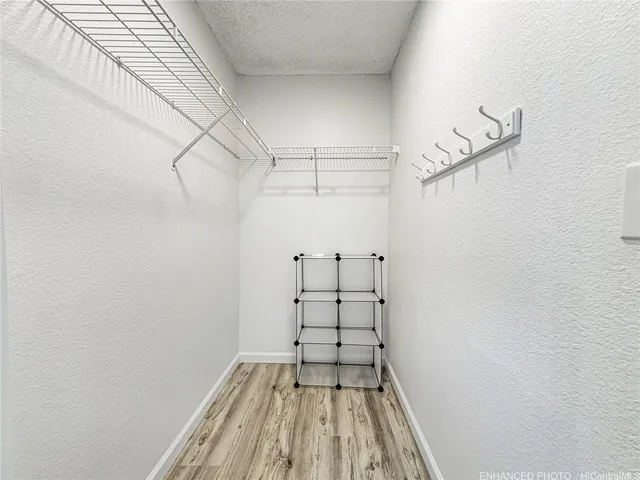 a view of a room with racks on the wall