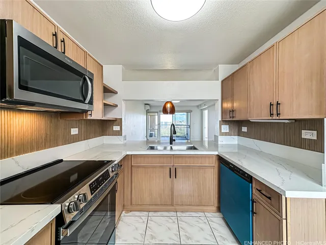 a kitchen with a stove and a microwave