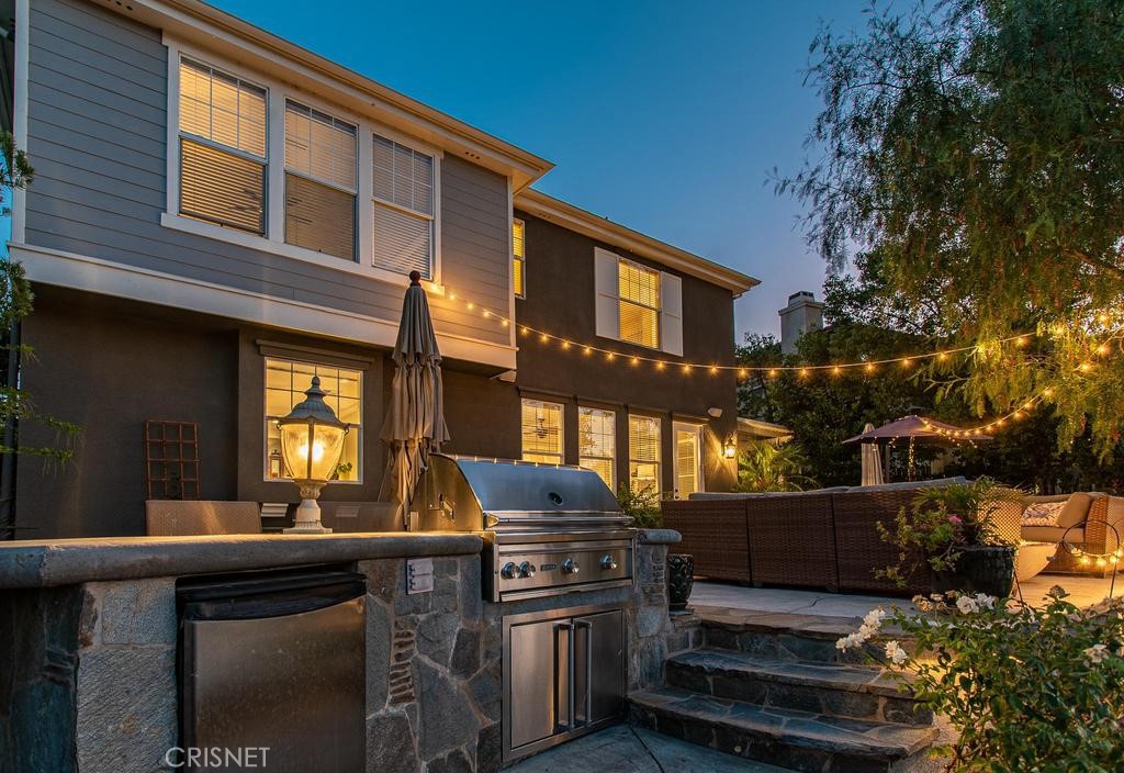 23915 Lakeside Road Valencia, CA 91355 - Photo 13 of 74 a front view of a house with a yard
