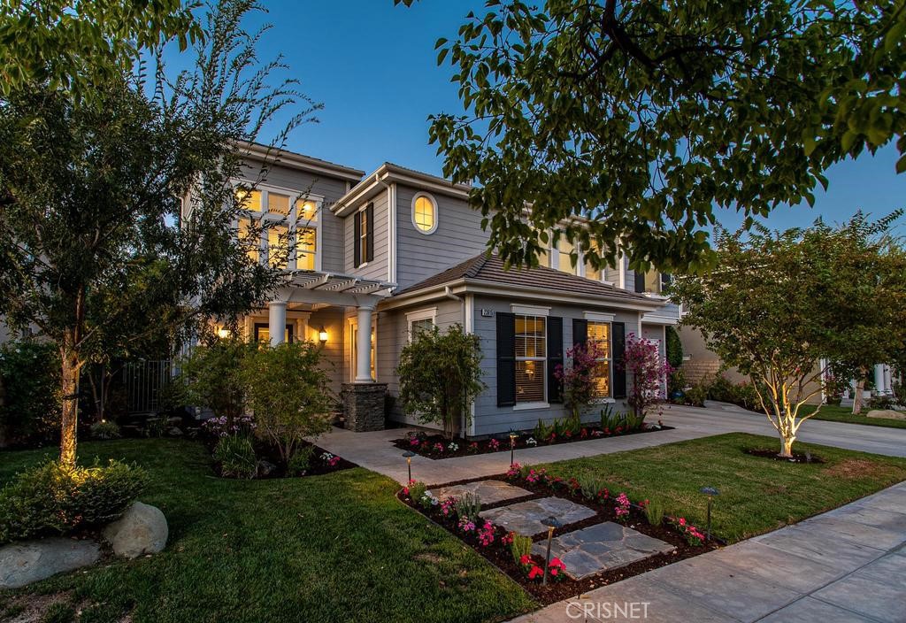 23915 Lakeside Road Valencia, CA 91355 - Photo 14 of 74 a front view of a house with garden
