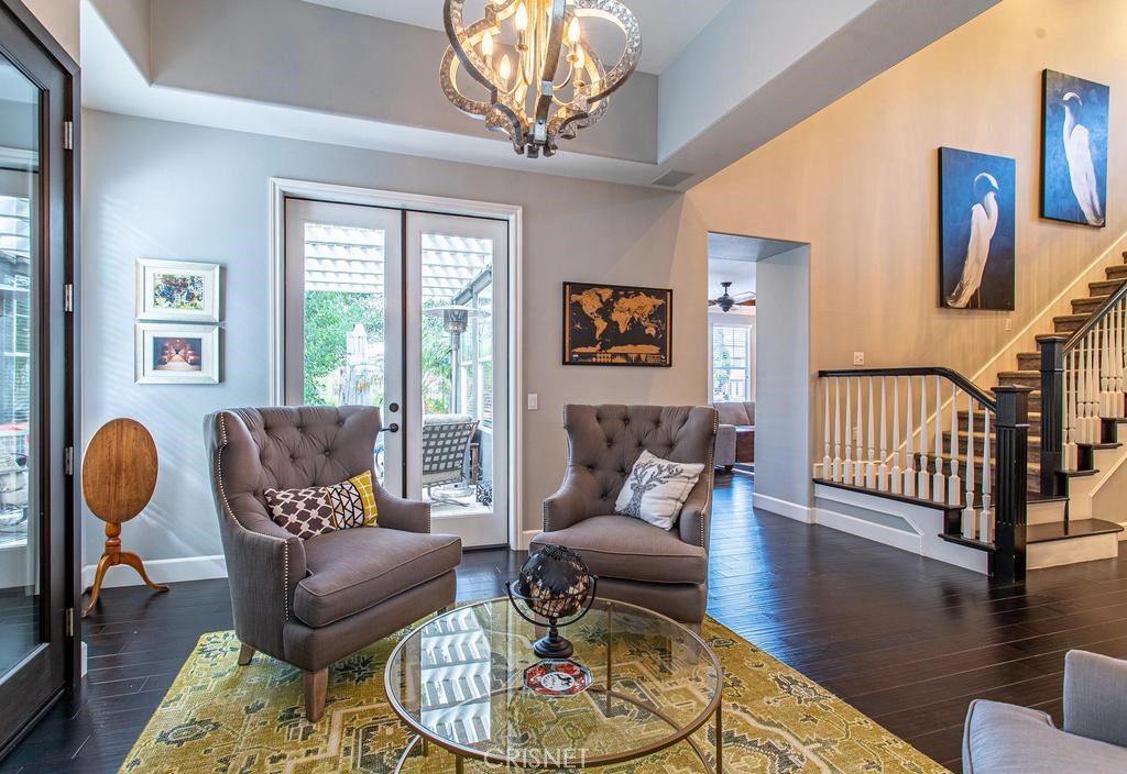 23915 Lakeside Road Valencia, CA 91355 - Photo 19 of 74 a living room with furniture and wooden floor