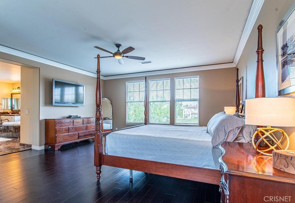 23915 Lakeside Road Valencia, CA 91355 - Photo 41 of 74 a bedroom with furniture and wooden floor