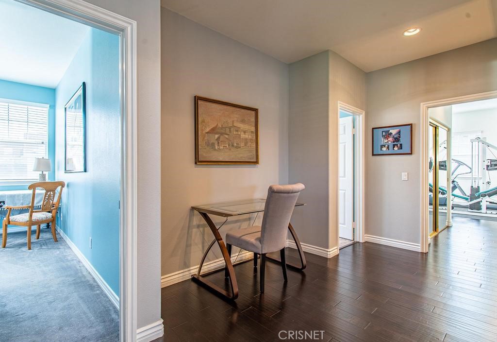 23915 Lakeside Road Valencia, CA 91355 - Photo 48 of 74 a view of a livingroom with furniture and a workspace