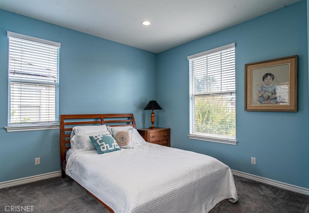 23915 Lakeside Road Valencia, CA 91355 - Photo 49 of 74 a bedroom with a bed and a window