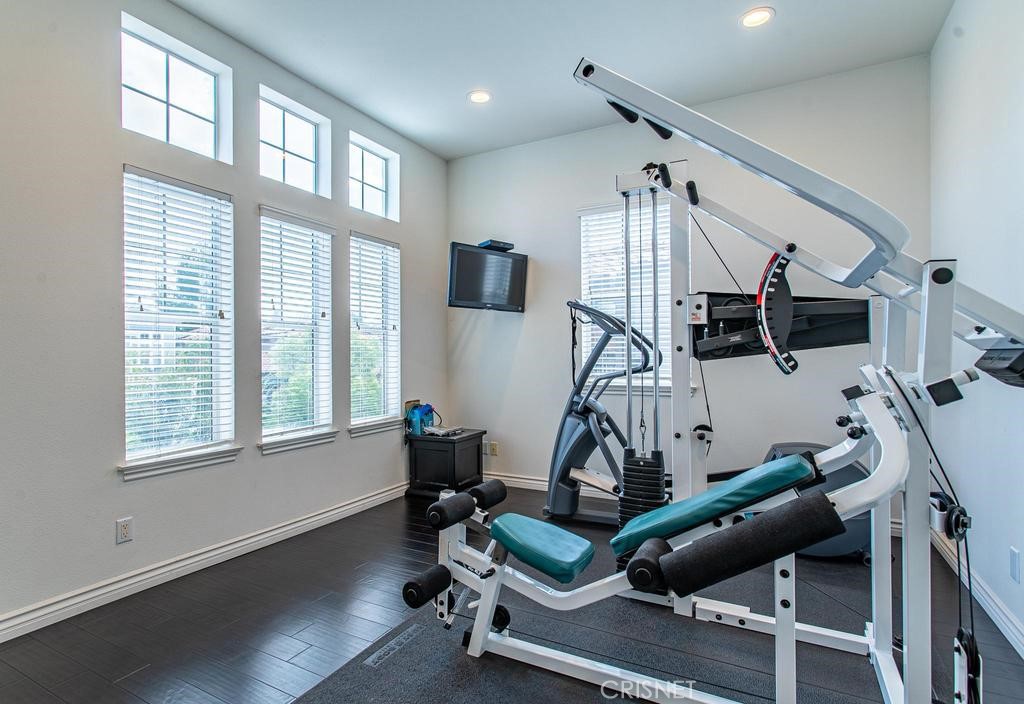 23915 Lakeside Road Valencia, CA 91355 - Photo 54 of 74 a view of a room with gym equipment