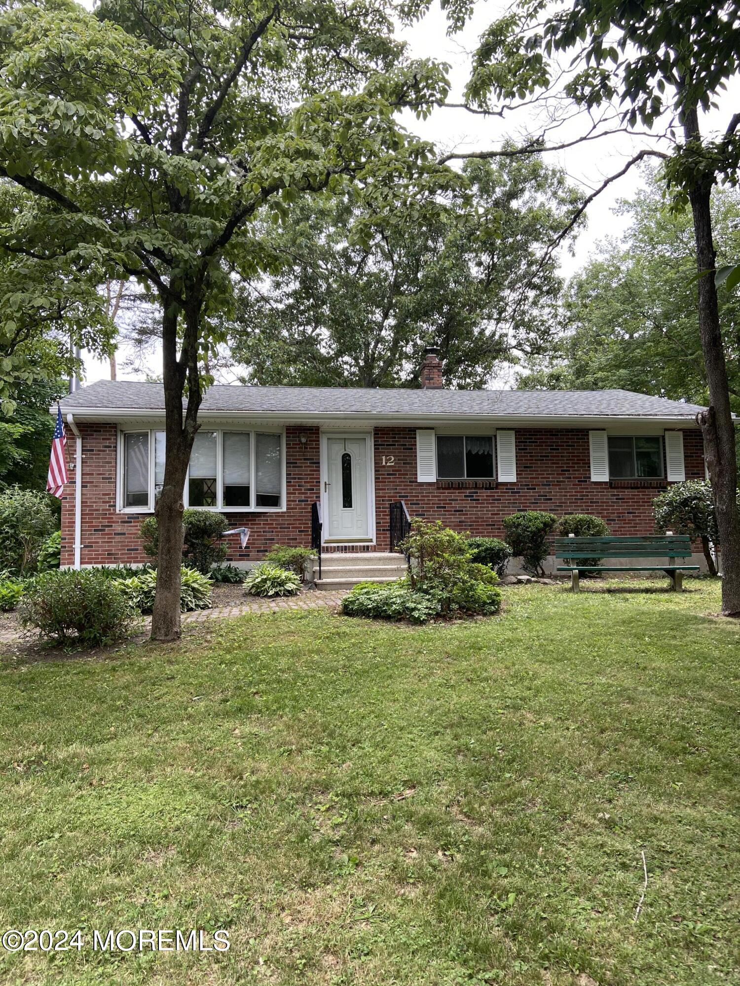 12 Main Street Cream Ridge, NJ 08514 - Photo 2 of 25 a front view of house with yard and green space