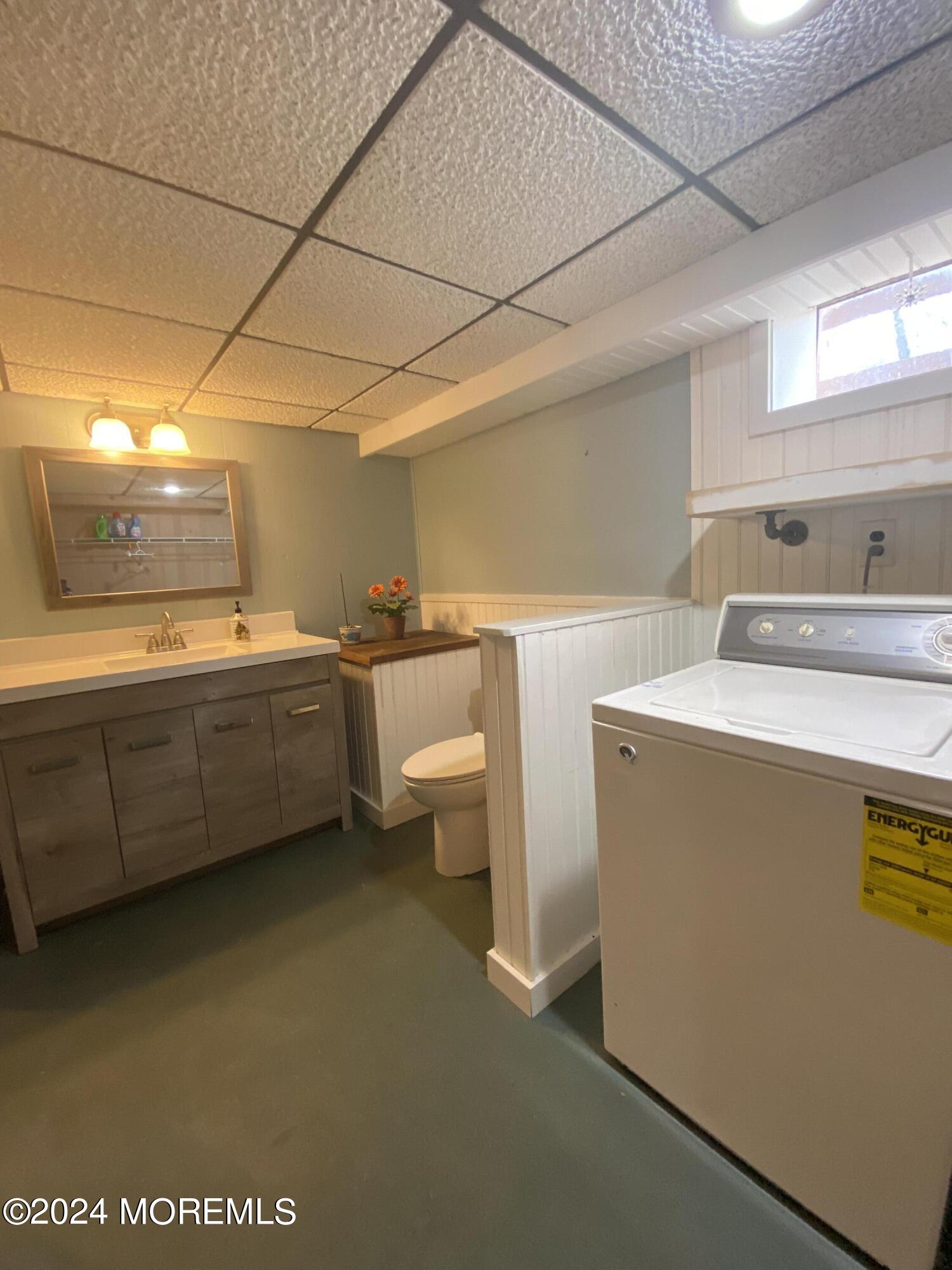 12 Main Street Cream Ridge, NJ 08514 - Photo 22 of 25 a room with sink washer and dryer