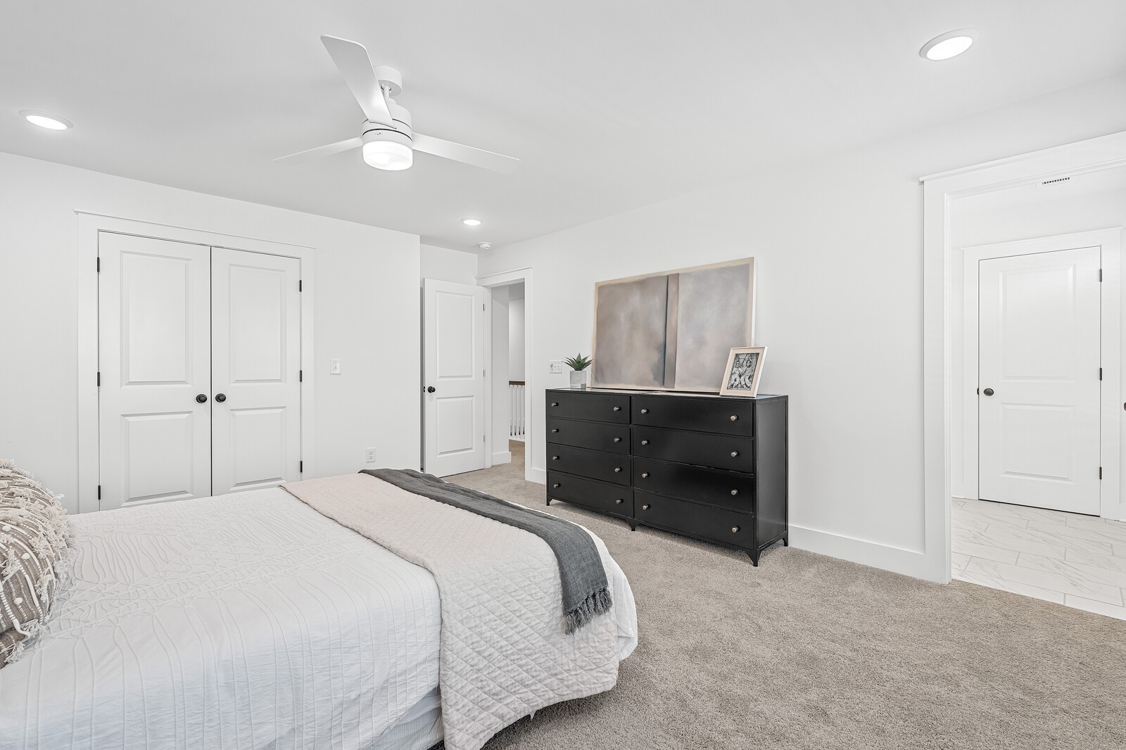 2001 Braidwood Lane Franklin, TN 37064 - Photo 20 of 35 a bedroom with a bed and a chandelier