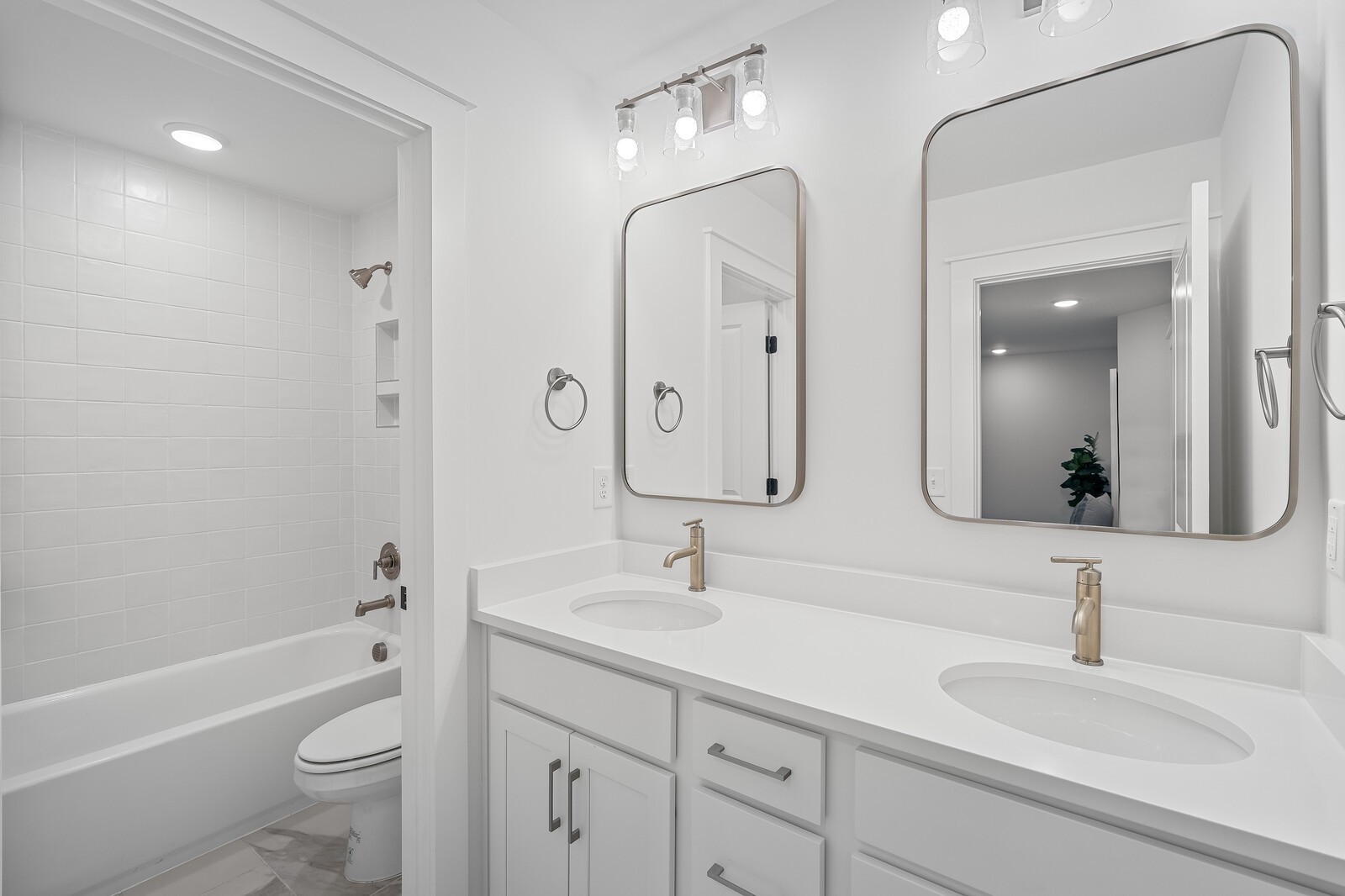 2001 Braidwood Lane Franklin, TN 37064 - Photo 30 of 35 a bathroom with a double vanity sink mirror double and a bathtub