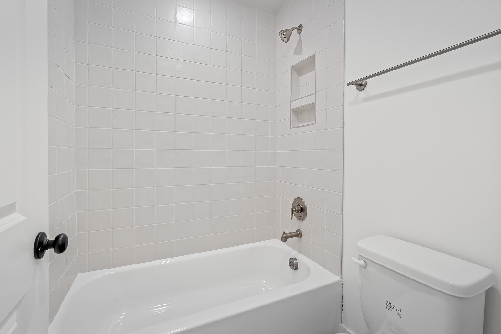 2001 Braidwood Lane Franklin, TN 37064 - Photo 31 of 35 a bathroom with a bathtub and a toilet
