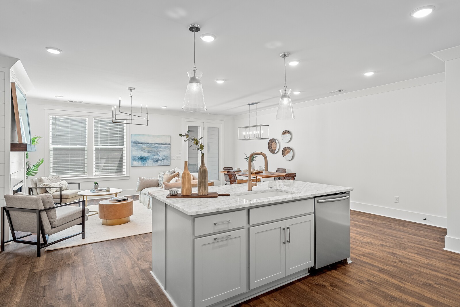 2001 Braidwood Lane Franklin, TN 37064 - Photo 8 of 35 a open kitchen with a sink dishwasher white cabinets and couches with wooden floor