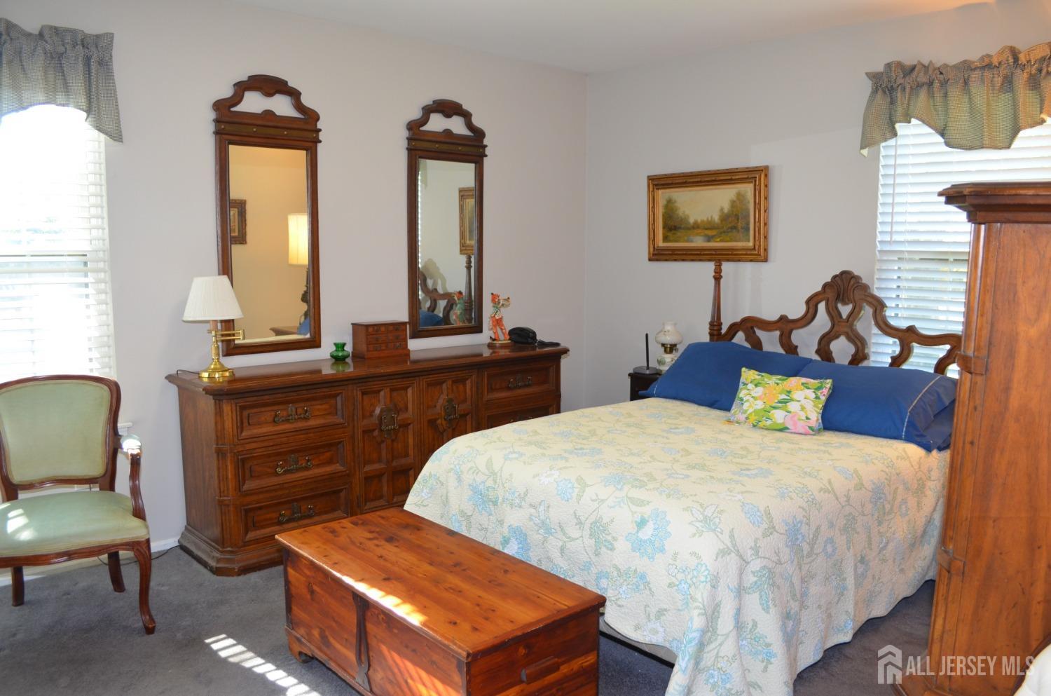 19 Foxhall Middlesex, NJ 08846 - Photo 11 of 21 a bedroom with a bed and a dresser