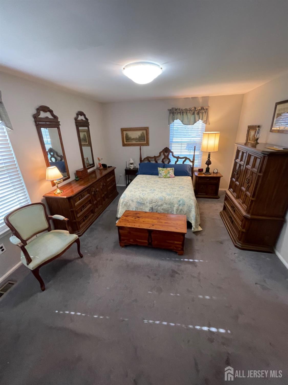 19 Foxhall Middlesex, NJ 08846 - Photo 12 of 21 a spacious bedroom with a bed and couch