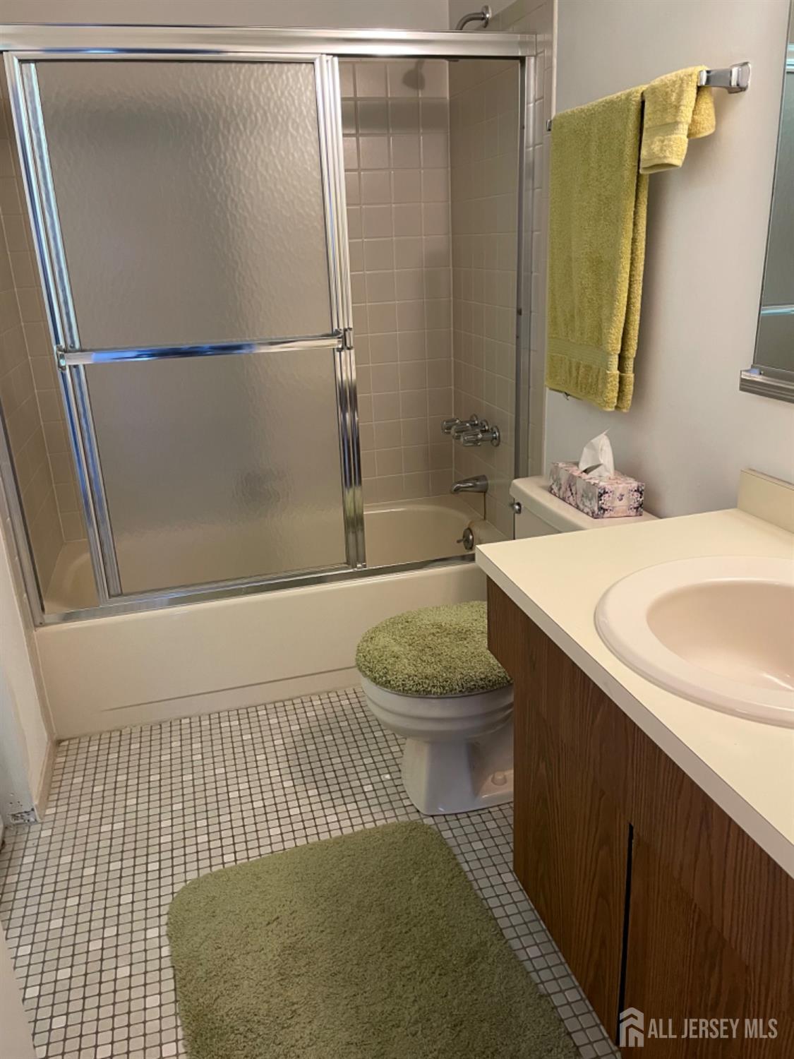 19 Foxhall Middlesex, NJ 08846 - Photo 17 of 21 a bathroom with a sink a toilet and shower