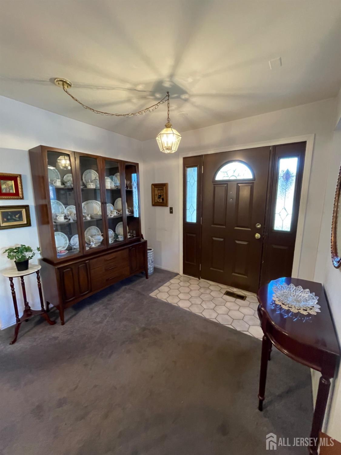 19 Foxhall Middlesex, NJ 08846 - Photo 3 of 21 a spacious bedroom with a bed dresser and a window