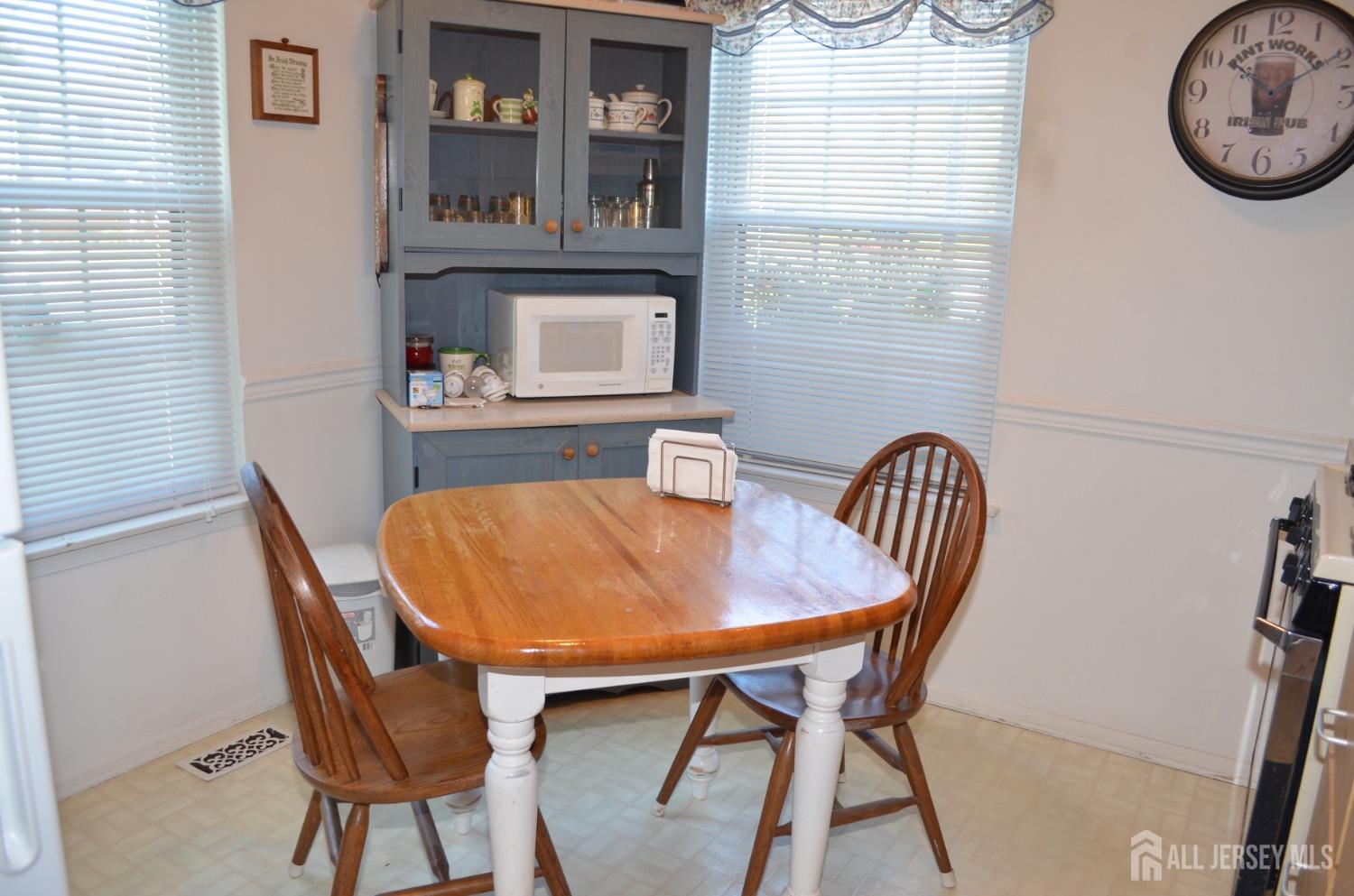 19 Foxhall Middlesex, NJ 08846 - Photo 7 of 21 a view of a dining room with furniture and window