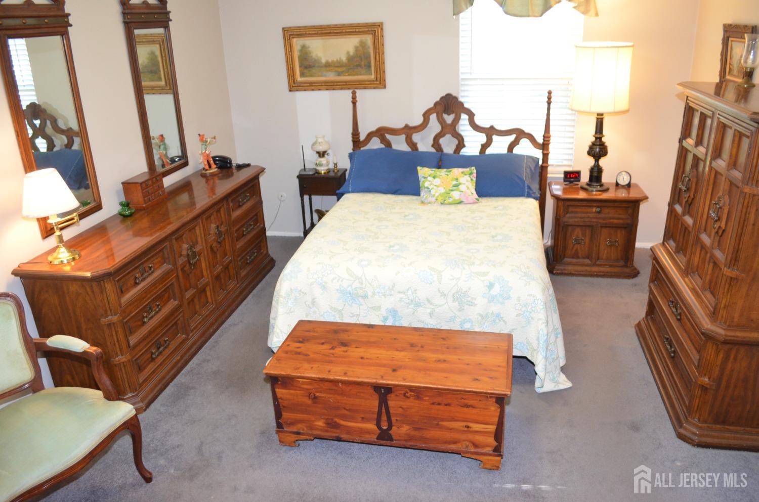 19 Foxhall Middlesex, NJ 08846 - Photo 10 of 21 a bed room with furniture and a flat screen tv