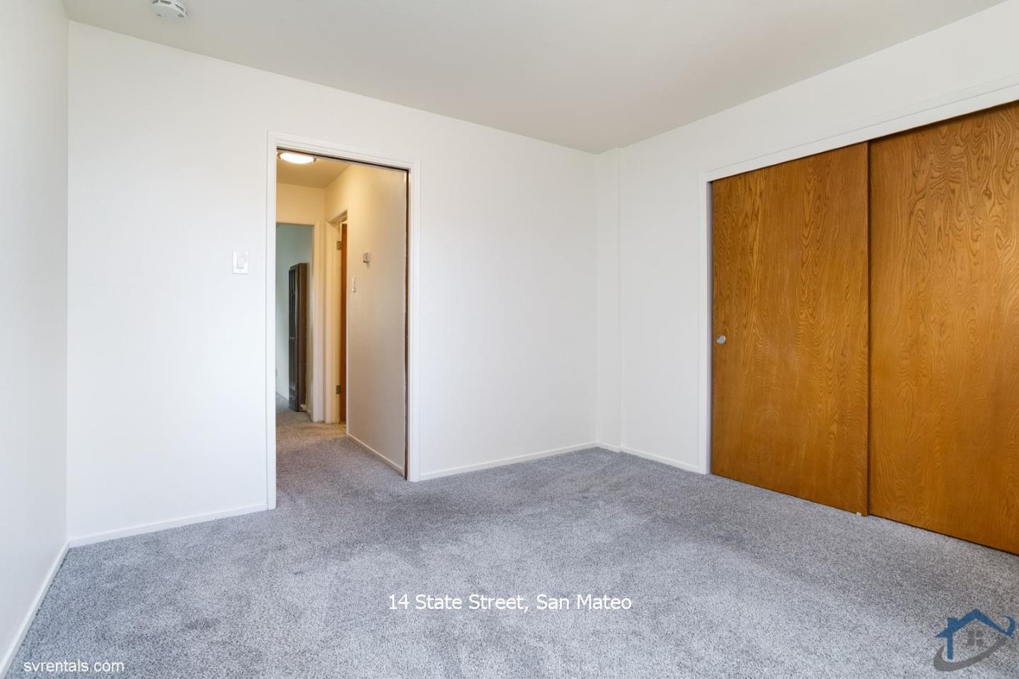 14 State Street, Unit 6 San Mateo, CA 94401 - Photo 13 of 20 a view of an empty room with closet and a window