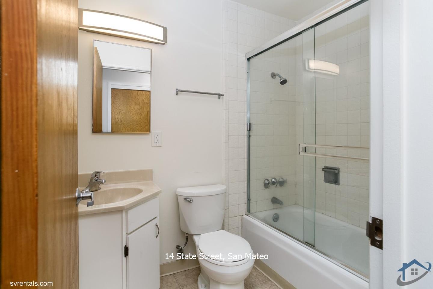 14 State Street, Unit 6 San Mateo, CA 94401 - Photo 17 of 20 a bathroom with a sink a toilet and shower