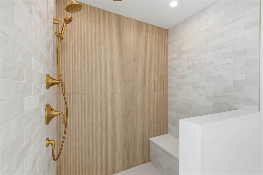 16 Couture Way Middleton, MA 01949 - Photo 25 of 36 a bathroom with a shower and a toilet sink