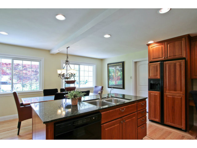 1761 Lantis Lane Los Altos, CA 94024 - Photo 7 of 19 a kitchen with granite countertop a sink cabinets and stainless steel appliances