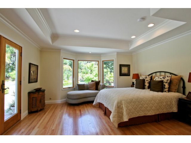 1761 Lantis Lane Los Altos, CA 94024 - Photo 8 of 19 a bedroom with a bed and a flat tv screen on dresser