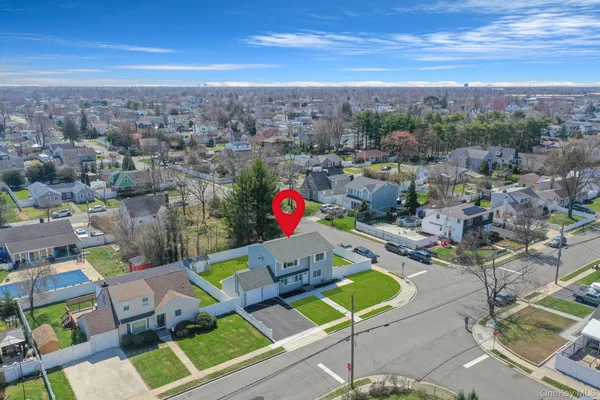 an aerial view of a house with a outdoor space