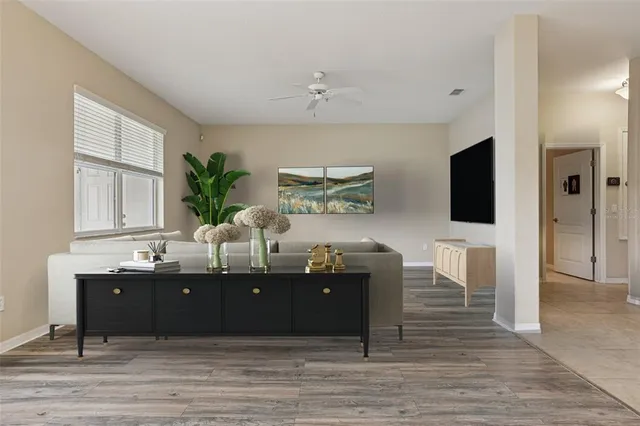 a view of an empty room with a window