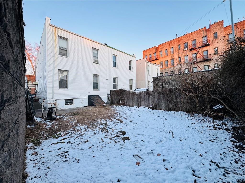 718 Bay Ridge Avenue Brooklyn, NY 11228 - Photo 3 of 6 a view of a backyard with large trees