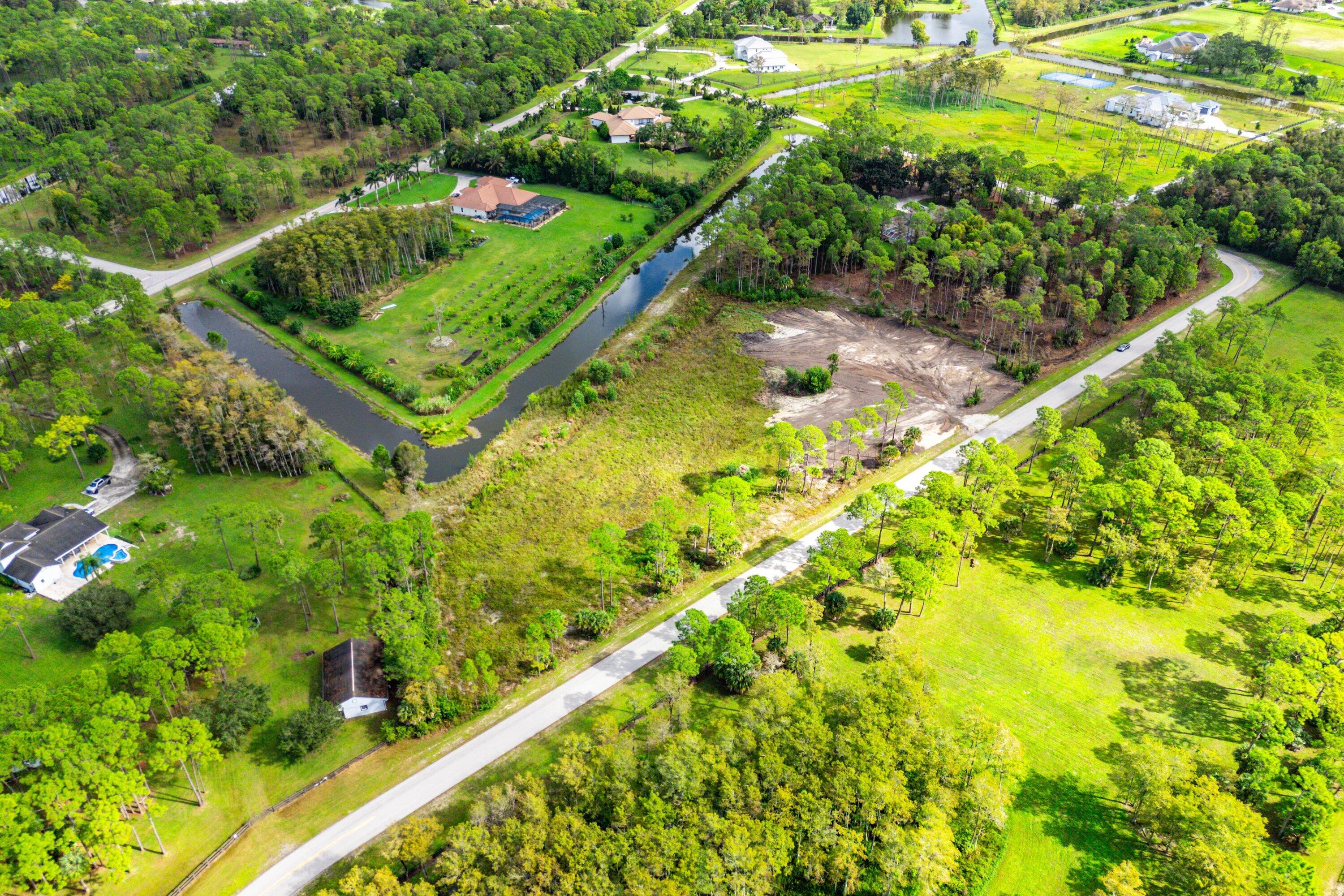 6269 Wild Orchid Trail Lake Worth, FL 33449 - Photo 2 of 12 a view of an outdoor space