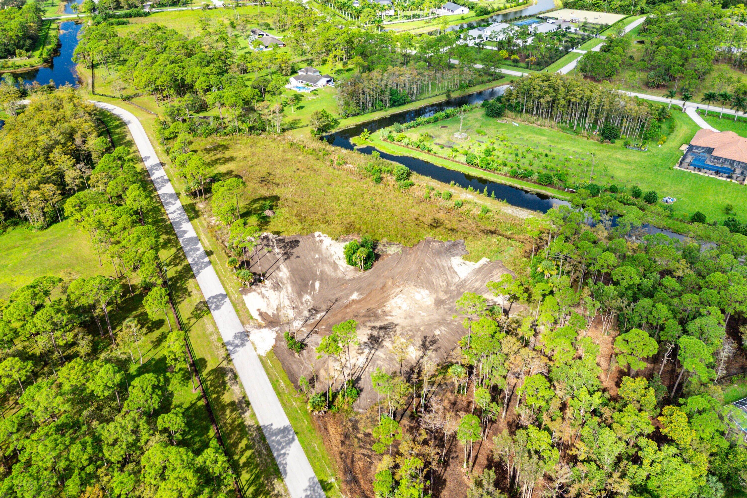6269 Wild Orchid Trail Lake Worth, FL 33449 - Photo 9 of 12 a view of a yard with plants