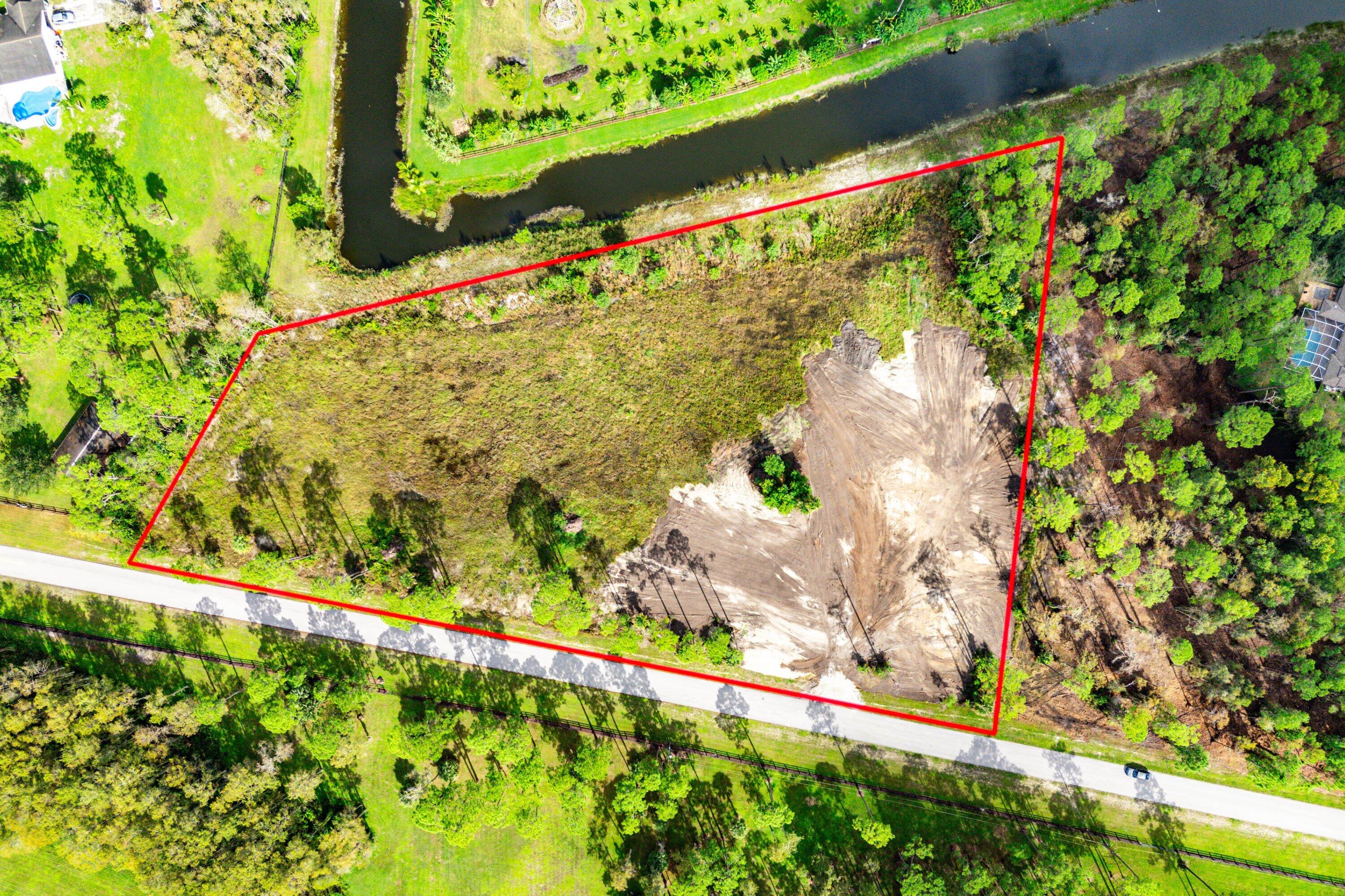 6269 Wild Orchid Trail Lake Worth, FL 33449 - Photo 10 of 12 a view of a garden