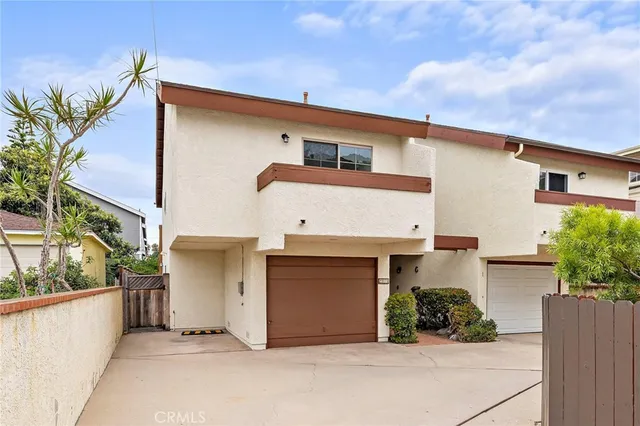 a view of a house with a garage