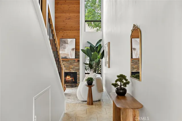 a view of a livingroom with furniture and window