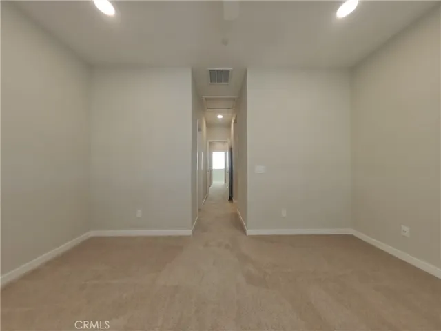 wooden floor and window in an empty room