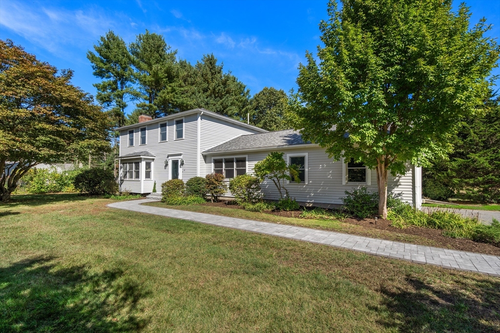 115 Victoria Road Sudbury, MA 01776 - Photo 1 of 41 a front view of a house with a yard