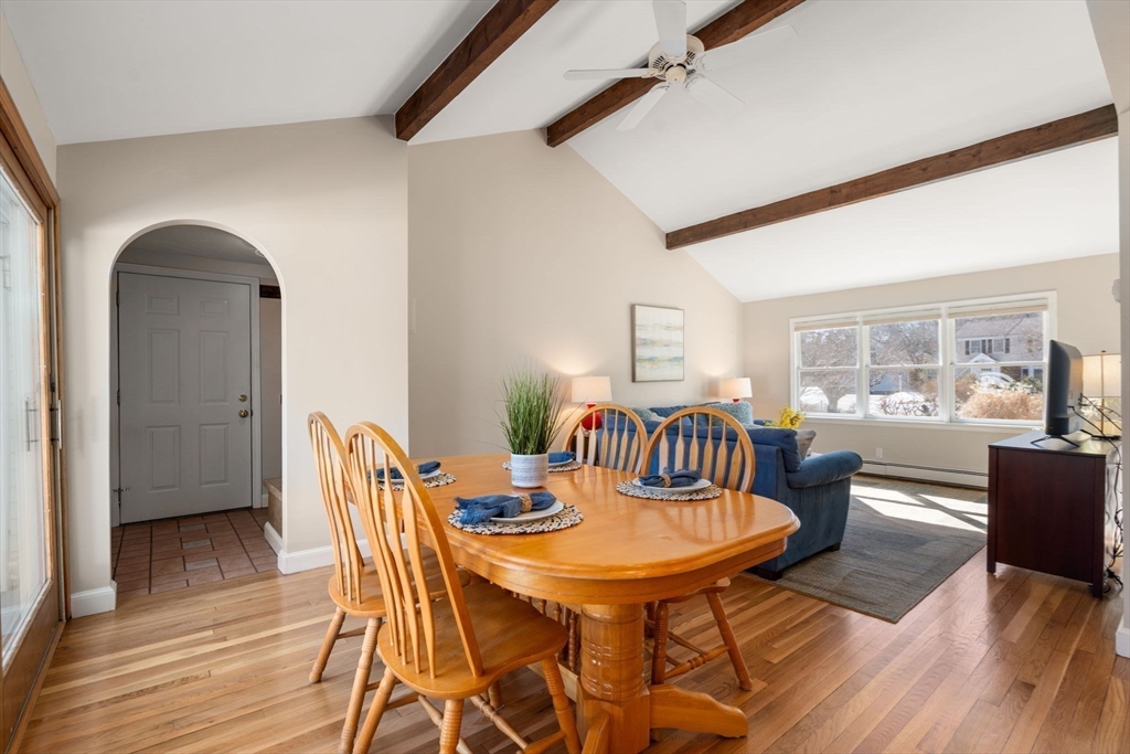 115 Victoria Road Sudbury, MA 01776 - Photo 15 of 41 a view of a dining room with furniture and wooden floor