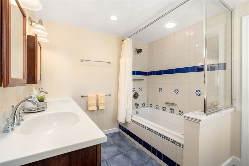 115 Victoria Road Sudbury, MA 01776 - Photo 24 of 41 a bathroom with a bathtub and a sink