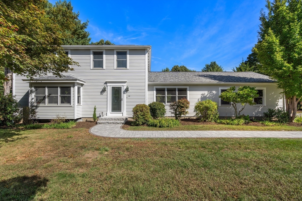 115 Victoria Road Sudbury, MA 01776 - Photo 3 of 41 a front view of a house with a yard