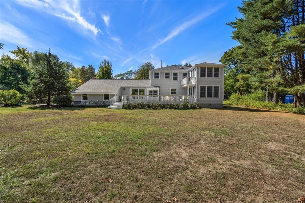 115 Victoria Road Sudbury, MA 01776 - Photo 35 of 41 a view of a house with a yard