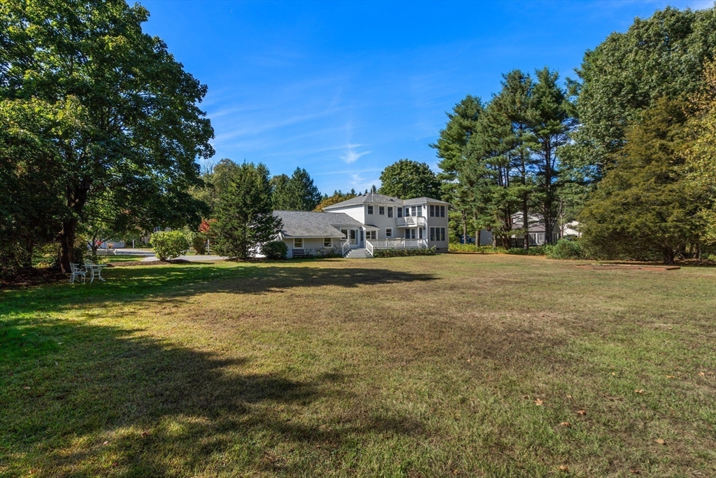 115 Victoria Road Sudbury, MA 01776 - Photo 36 of 41 a house view with swimming pool in outdoor space