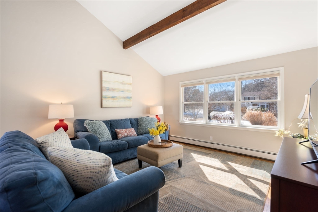 115 Victoria Road Sudbury, MA 01776 - Photo 8 of 41 a living room with furniture and a large window