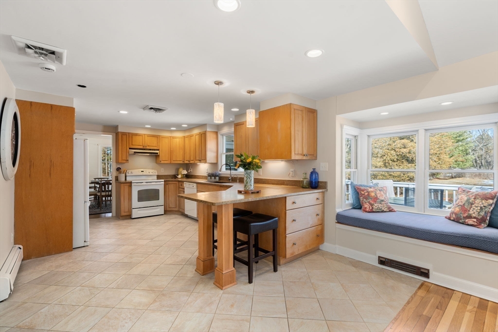 115 Victoria Road Sudbury, MA 01776 - Photo 10 of 41 a kitchen with a sink appliances and cabinets
