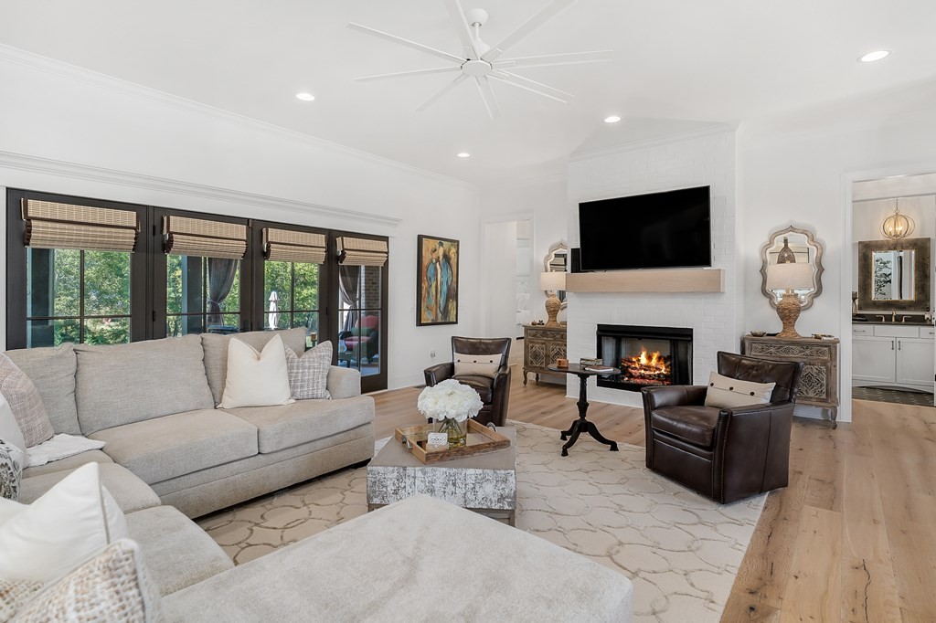 504 McCulley Road Cookeville, TN 38506 - Photo 19 of 70 a living room with furniture a fireplace and a flat screen tv