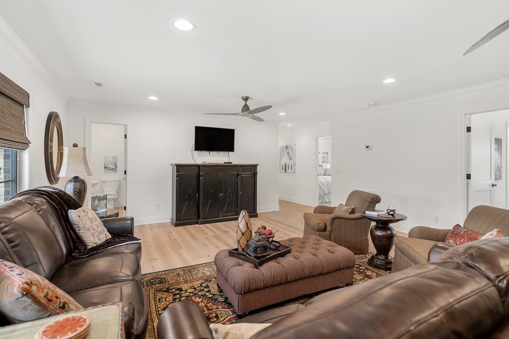 504 McCulley Road Cookeville, TN 38506 - Photo 42 of 70 a living room with furniture a fireplace and a flat screen tv