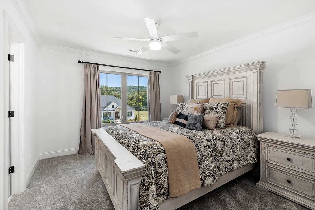 504 McCulley Road Cookeville, TN 38506 - Photo 43 of 70 a bedroom with a large bed and a window